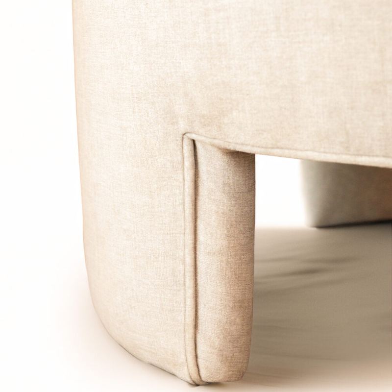 Detail of an upholstered leg cut from the body of the chair